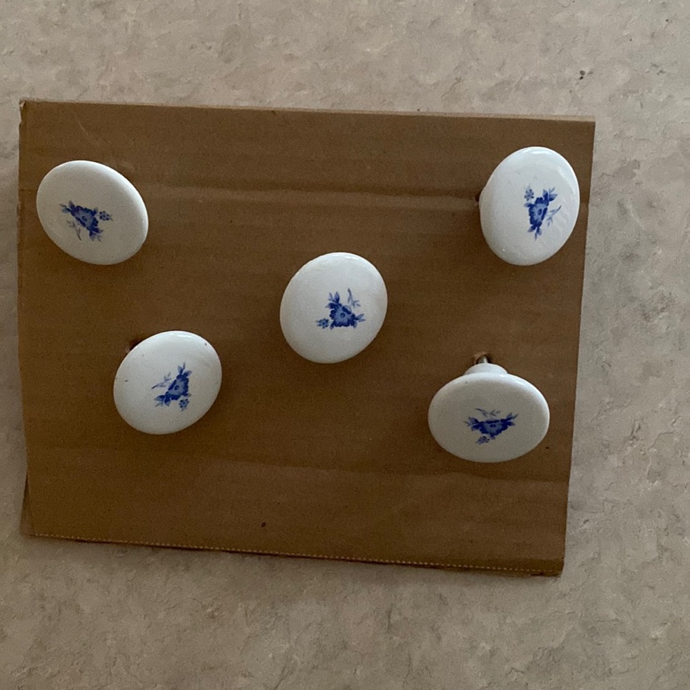 Five vintage porcelain dresser or cabinet knobs